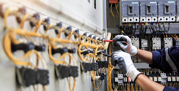 Professional Electrician technician working in Oyster Creek, TX